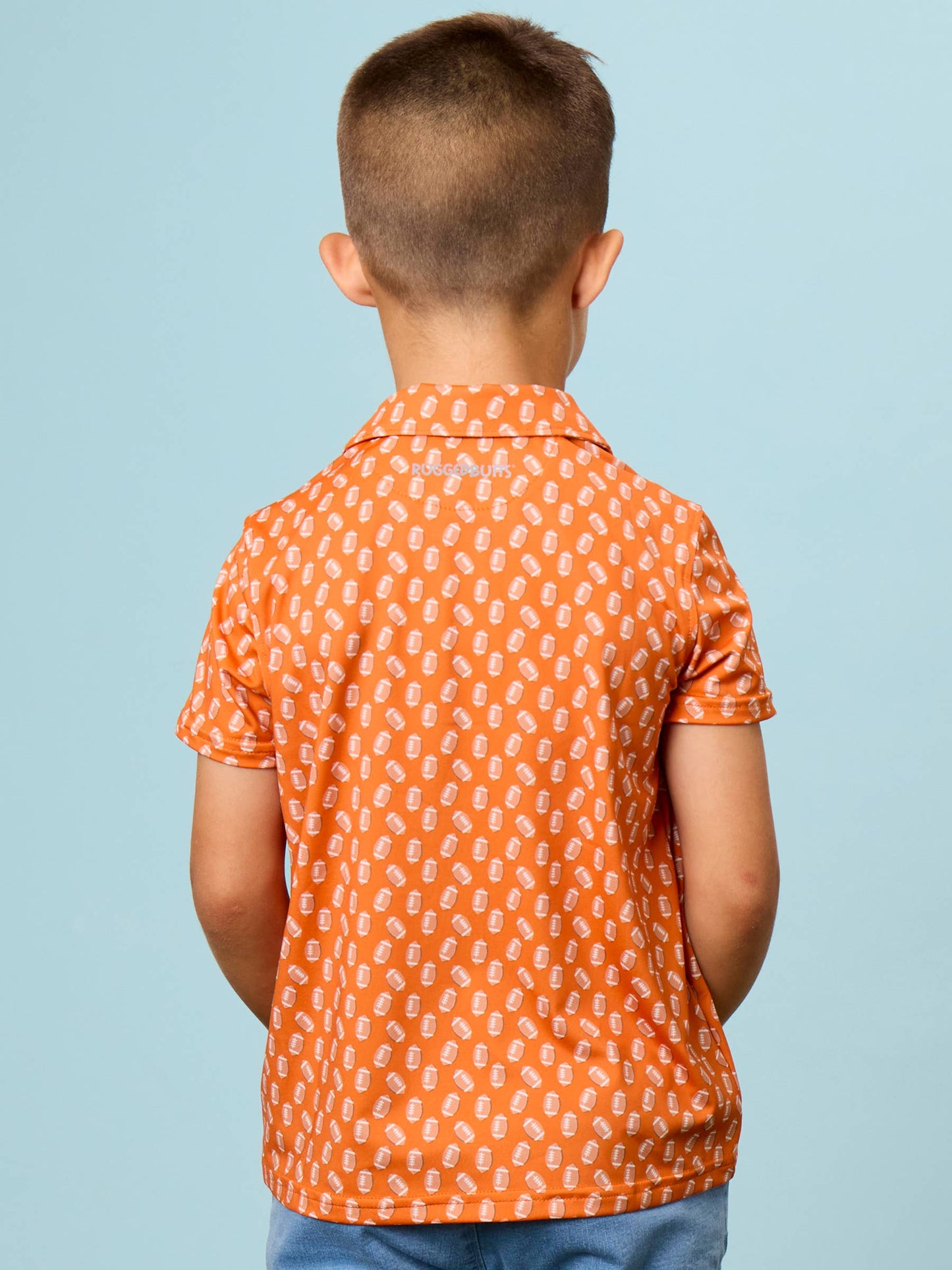 Boys Varsity Orange Football Frenzy Knit Short Sleeve Performance Polo