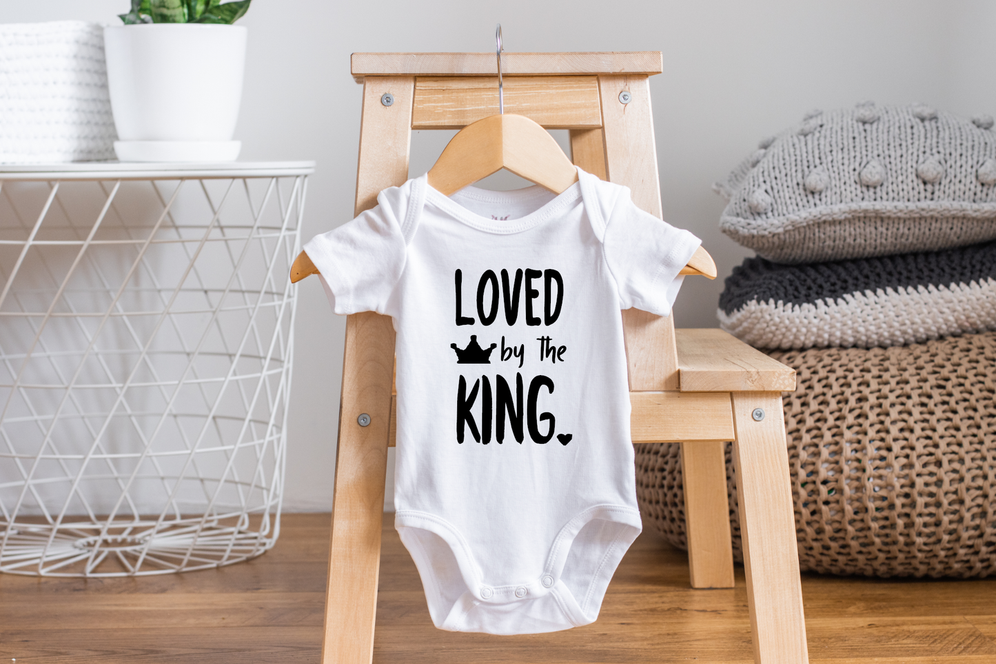 Loved By the King Biblical Newborn Onesie